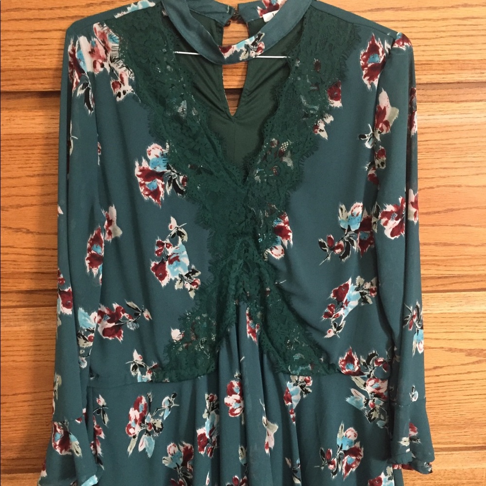 Green flowing blouse.